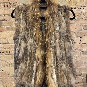 Knit rabbit fur vest with coyote trim.